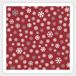 Winter pattern made of colorful snowflakes on red Sticker